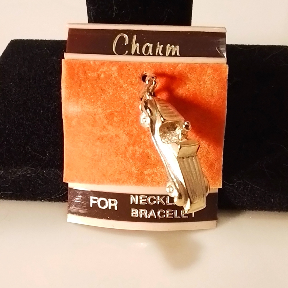 Gold tone car bracelet charm